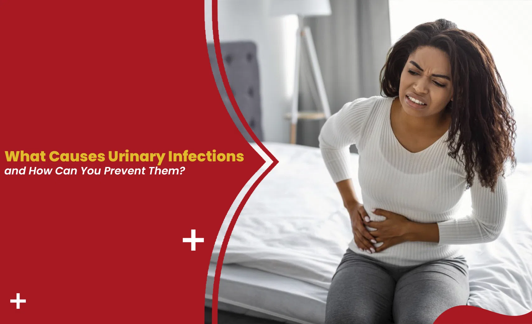 Woman holding her stomach in discomfort, illustrating urinary tract infection causes and prevention
